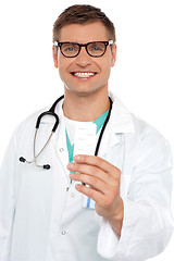 Image showing Portrait of a young doctor with medicines