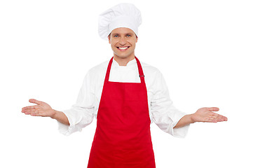 Image showing Joyful chef welcoming his guests