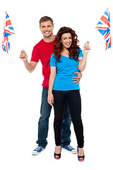 Image showing Cheerful UK supporters posing together