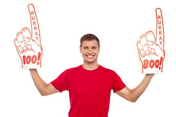 Image showing Young energetic fan showing his support