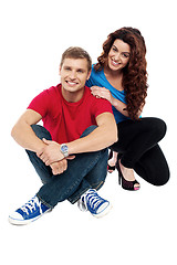 Image showing Attractive love couple sitting relaxed on floor