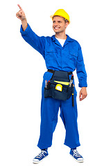 Image showing Construction worker pointing at copy space area