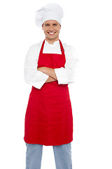 Image showing Confident cheerful male chef with arms crossed