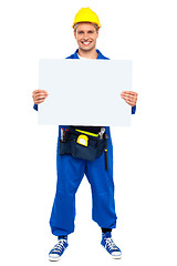 Image showing Industrial contractor showing blank billboard