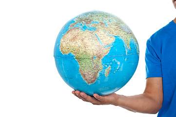 Image showing Cropped image of man holding globe