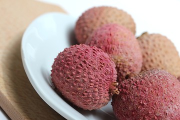 Image showing fresh lychees on a porcelain plate