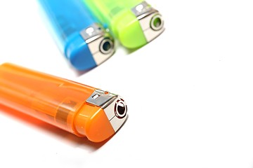 Image showing three colorful lighters