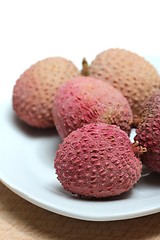 Image showing fresh lychees on a porcelain plate