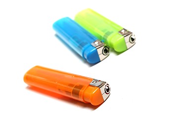 Image showing three colorful lighters