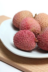 Image showing fresh lychees on a porcelain plate