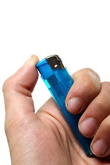 Image showing blue lighter in human hand