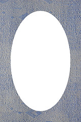 Image showing textures on wall backdrop and white oval in center 