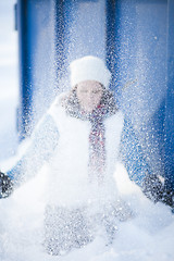 Image showing Woman throwing snow