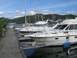 Image showing Line of boats in a marina