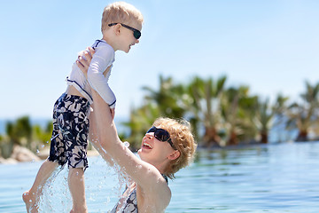 Image showing mother and her son in the pool