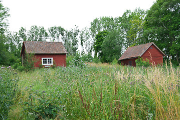 Image showing Scandinavian summer, traditional old red houses