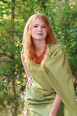 Image showing Beautiful woman in green