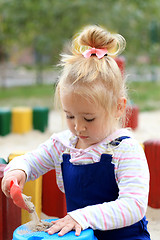 Image showing Playing with sand