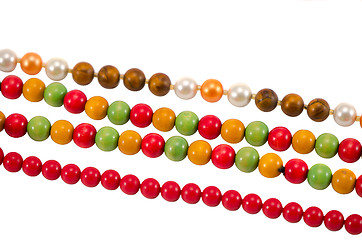 Image showing Pearl colorful wooden bead jewelry chain on white 