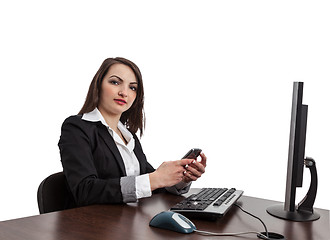 Image showing Businesswoman Checking Her Mobile