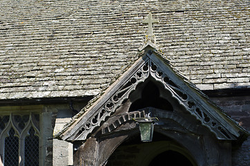 Image showing The wooden entrance porch to an old 14th Century church