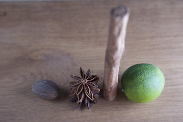 Image showing Lime, cinnamon,star anise, and nutmeg