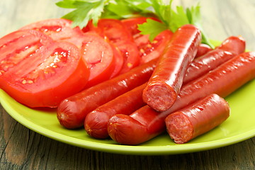 Image showing Smoked sausage and tomatoes.