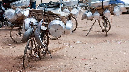 Image showing Pots and pans on bicycles