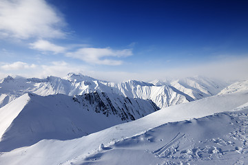 Image showing Snowy mountains and blue sky