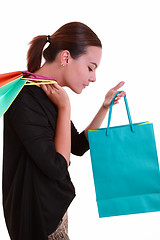 Image showing Young beautiful woman with shopping bags