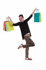 Image showing Young beautiful woman with shopping bags