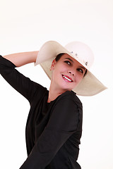 Image showing Young woman with white summer hat