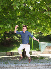 Image showing Jumping red hair man