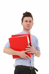 Image showing Serious man with folders