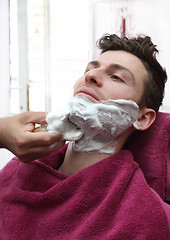 Image showing Portrait of young man at barber shop