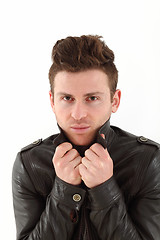 Image showing Young adult man posing with leather jacket