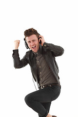 Image showing Young adult male dancing and  listening music