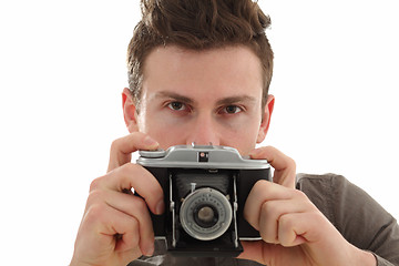 Image showing Young adult male with olf film camera