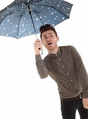 Image showing Handsome man with an umbrella