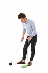 Image showing Handsome man dancing and cleaning