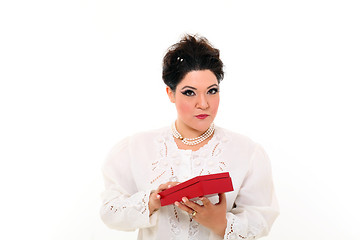 Image showing Elegant plus size woman with a box
