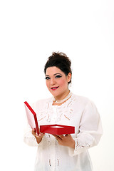 Image showing Elegant plus size woman with a box