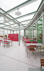 Image showing Empty restaurant interior with stage waiting for customers. 