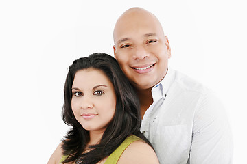 Image showing Closeup portrait of a sweet happy young couple smiling together.