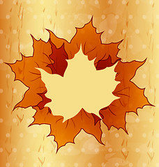 Image showing Autumnal maple leaves, wooden texture