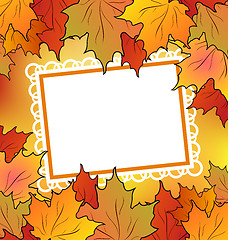 Image showing Autumn maple leaves with floral greeting card