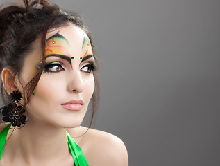 Image showing Cute girl with proffesional make up looking somewhere