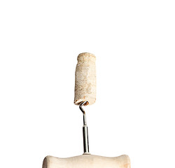 Image showing Cork and corkscrew on white background