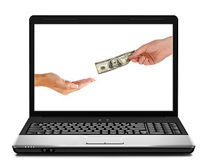 Image showing US dollars coming from laptop