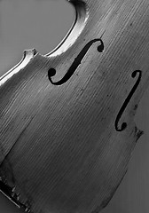 Image showing Black and white image of an antique violin on display